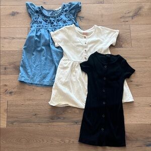 Set of Three Girls' Dresses - Blue, Cream, and Black